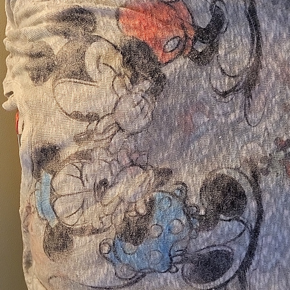 Disney parks knitted shirt.